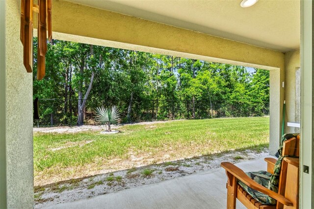 9 Waldron Pl, Palm Coast, FL 32164 - view of yard with a patio area and view of scattered trees