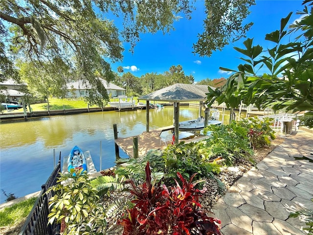 4 Cotton Ct, Palm Coast, FL 32137 - dock area featuring a water view and boat lift