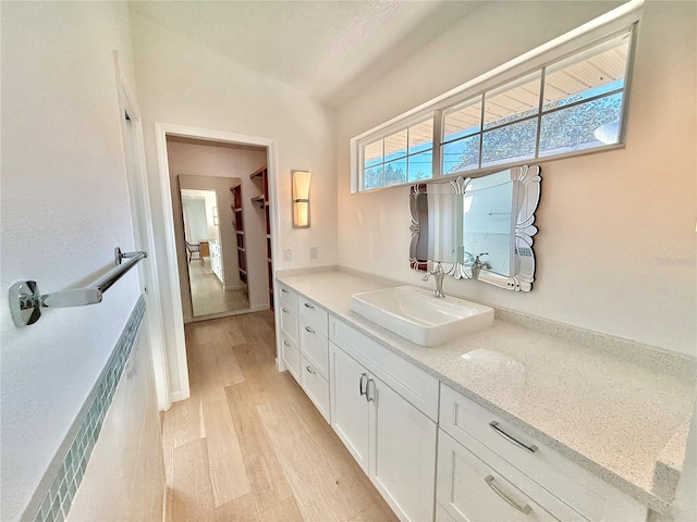 4 Cotton Ct, Palm Coast, FL 32137 - bathroom featuring vanity and wood finished floors