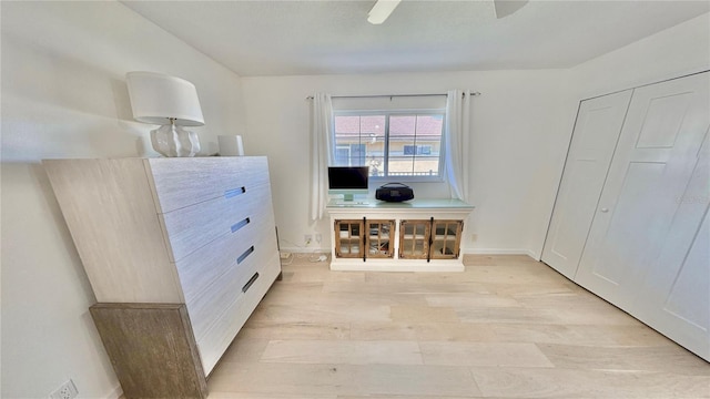 4 Cotton Ct, Palm Coast, FL 32137 - home office with light wood-type flooring, a ceiling fan, and baseboards