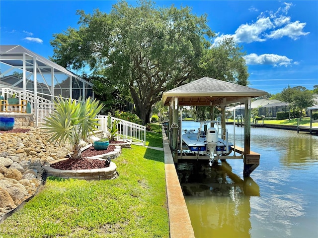 4 Cotton Ct, Palm Coast, FL 32137 - dock with boat lift, a water view, and a yard