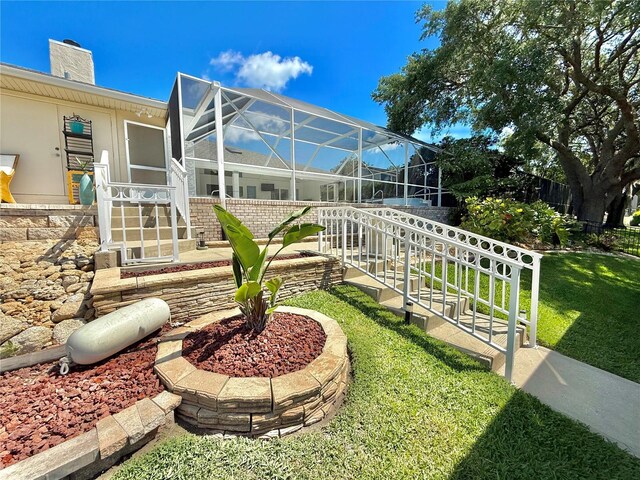 4 Cotton Ct, Palm Coast, FL 32137 - view of green lawn featuring glass enclosure