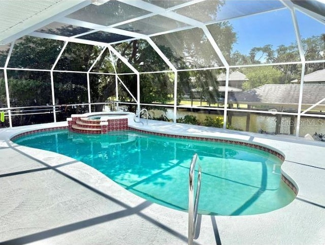 4 Cotton Ct, Palm Coast, FL 32137 - view of swimming pool featuring a patio and a pool with connected hot tub