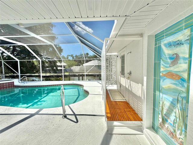 4 Cotton Ct, Palm Coast, FL 32137 - outdoor pool featuring a patio area and a lanai