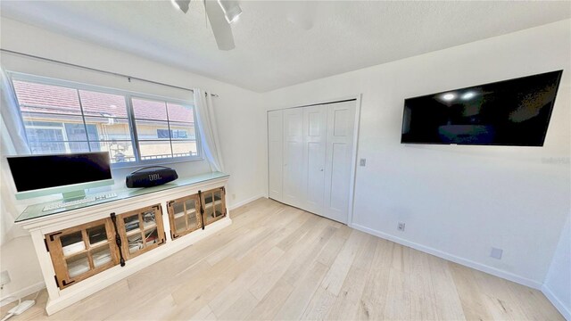 4 Cotton Ct, Palm Coast, FL 32137 - home office featuring wood finished floors, ceiling fan, and baseboards