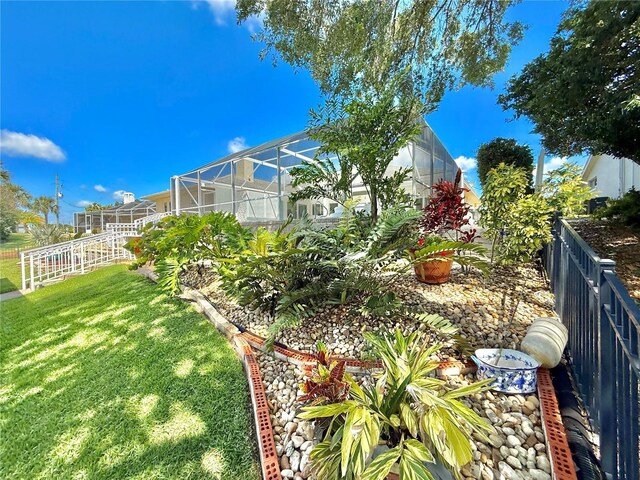 4 Cotton Ct, Palm Coast, FL 32137 - view of yard featuring a lanai