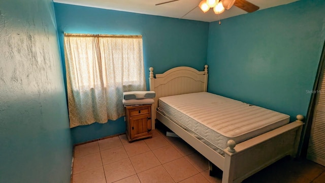 20 Eastgate Ln, Palm Coast, FL 32164 - bedroom with light tile patterned floors and ceiling fan