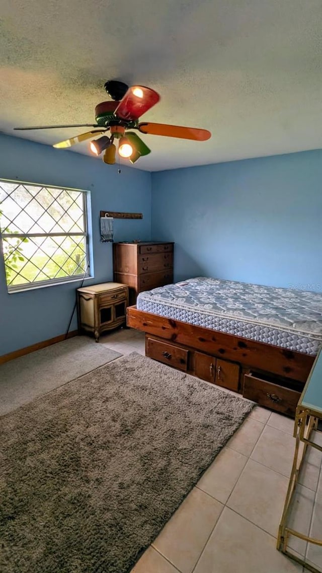 20 Eastgate Ln, Palm Coast, FL 32164 - bedroom featuring baseboards and ceiling fan