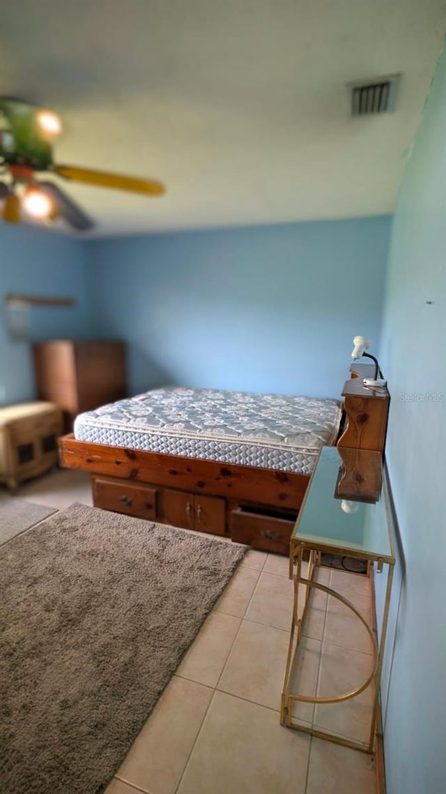 20 Eastgate Ln, Palm Coast, FL 32164 - bedroom featuring light tile patterned floors and ceiling fan