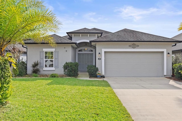 123 N Starling Dr, Palm Coast, FL 32164 - ranch-style house with stucco siding, driveway, roof with shingles, a front yard, and an attached garage