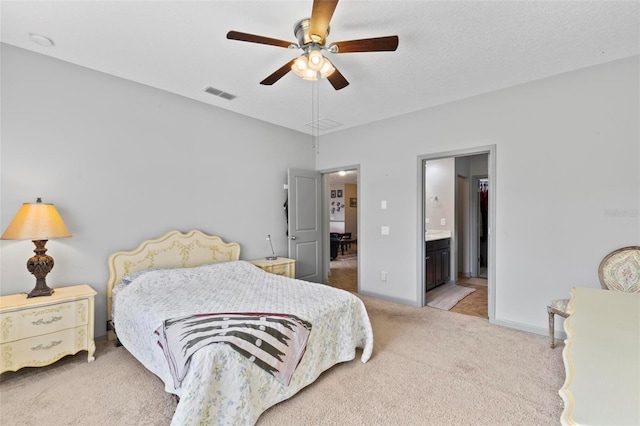 123 N Starling Dr, Palm Coast, FL 32164 - bedroom featuring carpet floors, ensuite bathroom, a ceiling fan, and baseboards