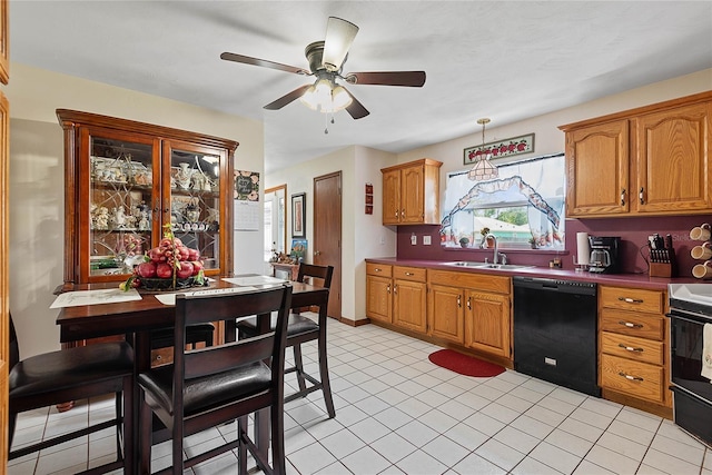 kitchen featuring dishwasher, range with electric stovetop, a sink, a ceiling fan, and brown cabinetry