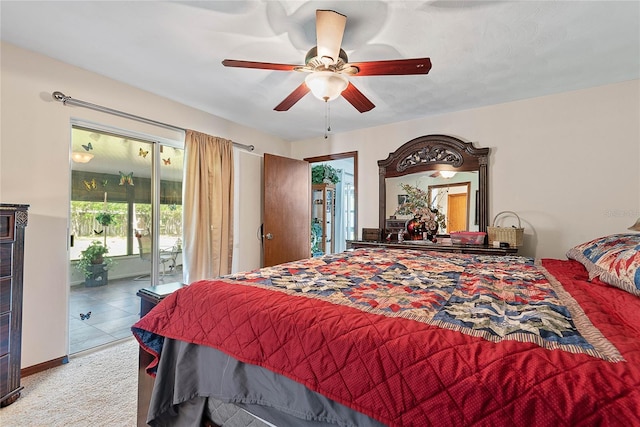 bedroom with access to exterior, ceiling fan, and carpet flooring