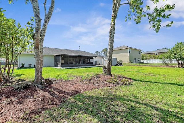 back of property featuring a sunroom