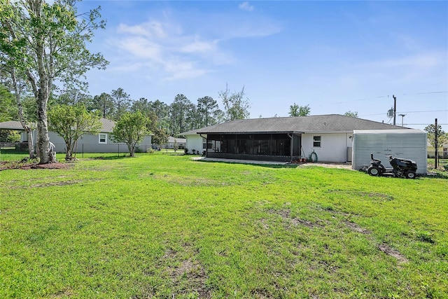 view of yard featuring a sunroom