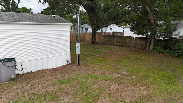 view of yard featuring central AC