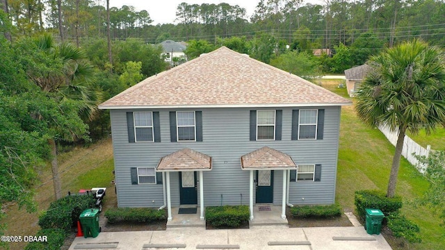 view of front facade featuring a shingled roof