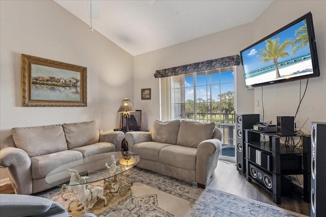 69 Rivers Edge Ln Unit 69, Palm Coast, FL 32137 - living area with wood finished floors and vaulted ceiling