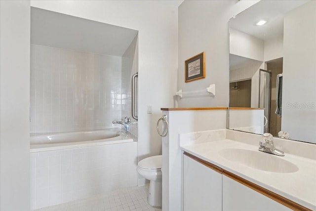 69 Rivers Edge Ln Unit 69, Palm Coast, FL 32137 - full bathroom with tile patterned flooring, toilet, and vanity