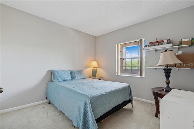 69 Rivers Edge Ln Unit 69, Palm Coast, FL 32137 - carpeted bedroom featuring baseboards