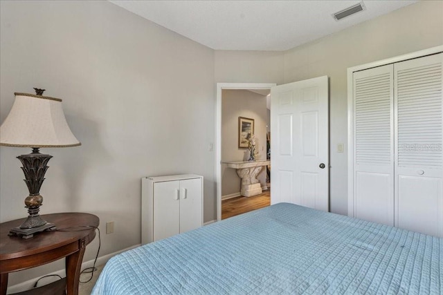 69 Rivers Edge Ln Unit 69, Palm Coast, FL 32137 - bedroom with baseboards and a closet