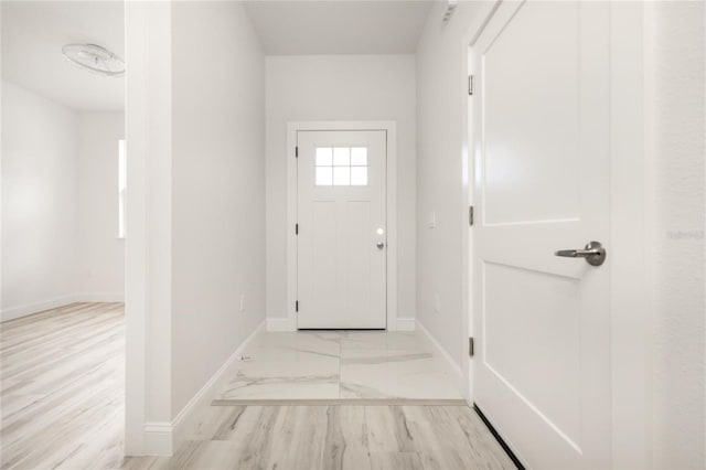 8 Bunker View Pl, Palm Coast, FL 32137 - doorway to outside with baseboards and marble finish flooring