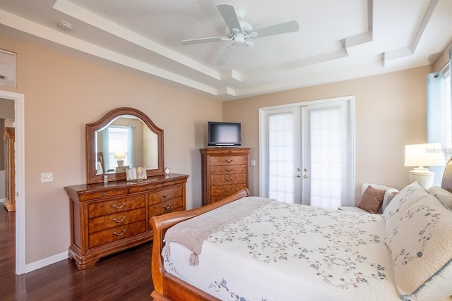 30 Westridge Ln, Palm Coast, FL 32164 - bedroom featuring a raised ceiling, dark wood-style floors, french doors, baseboards, and a ceiling fan