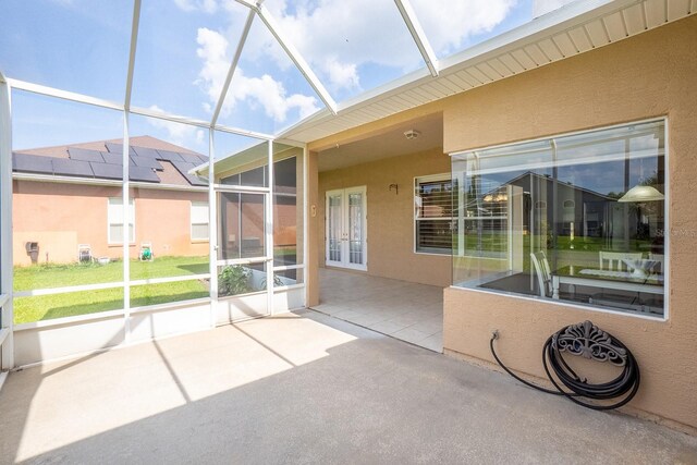 30 Westridge Ln, Palm Coast, FL 32164 - unfurnished sunroom with french doors