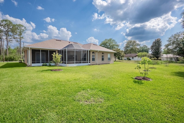 30 Westridge Ln, Palm Coast, FL 32164 - back of property with a sunroom and a lawn