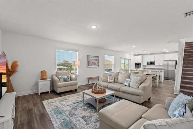 3828 S Atlantic Ave, Daytona Beach, FL 32118 - living area featuring recessed lighting, dark wood-type flooring, and stairway