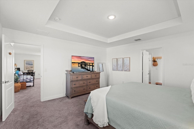 3828 S Atlantic Ave, Daytona Beach, FL 32118 - carpeted bedroom featuring a tray ceiling, attic access, and recessed lighting
