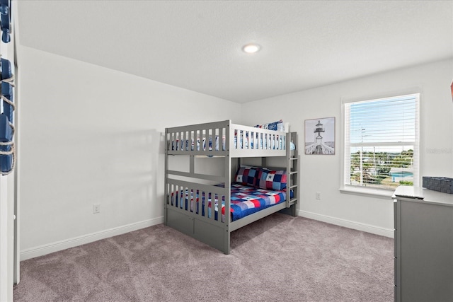 3828 S Atlantic Ave, Daytona Beach, FL 32118 - bedroom with carpet flooring