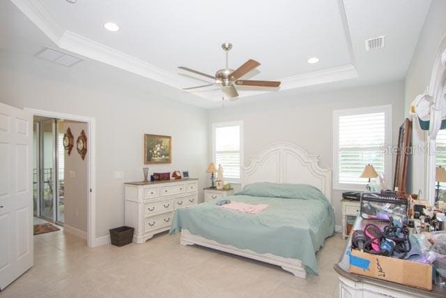 37 Lagoon Way, Palm Coast, FL 32137 - bedroom featuring a tray ceiling, recessed lighting, ornamental molding, ceiling fan, and baseboards