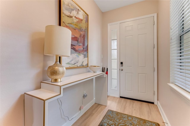 200 Riverfront Dr Unit B204, Palm Coast, FL 32137 - entryway with light wood-style flooring and baseboards