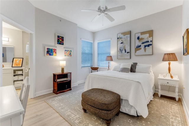 200 Riverfront Dr Unit B204, Palm Coast, FL 32137 - bedroom featuring baseboards, light wood finished floors, and ceiling fan