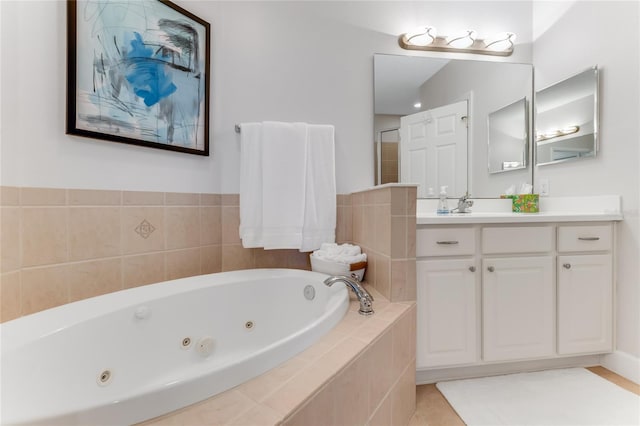 200 Riverfront Dr Unit B204, Palm Coast, FL 32137 - bathroom featuring a tub with jets and vanity