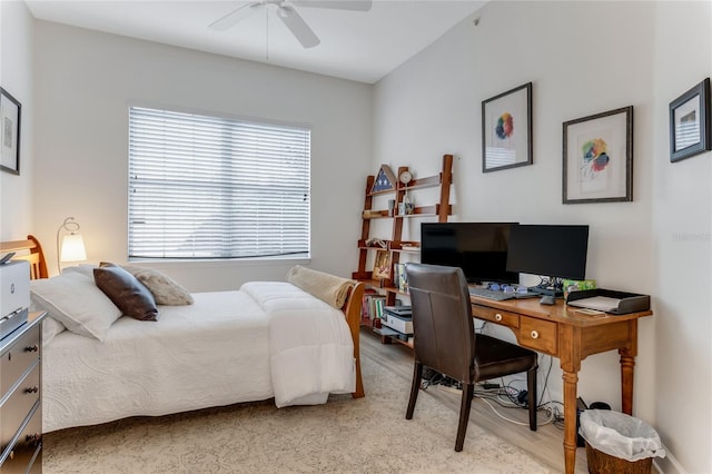 200 Riverfront Dr Unit B204, Palm Coast, FL 32137 - bedroom with multiple windows, light wood-style floors, an office area, and a ceiling fan
