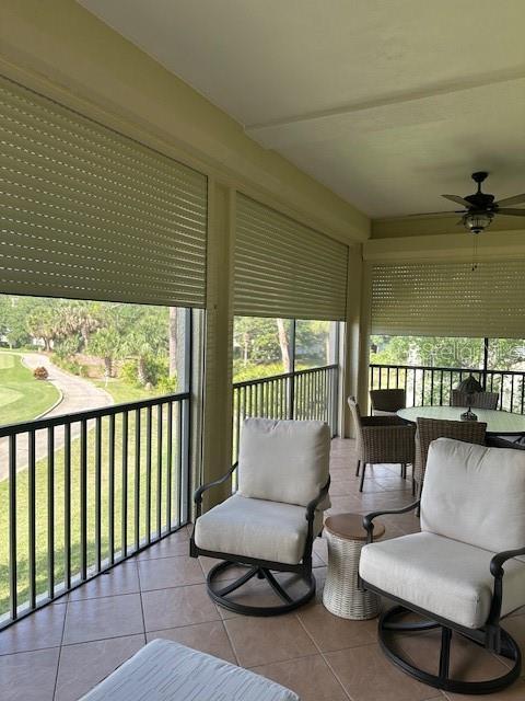 200 Riverfront Dr Unit B204, Palm Coast, FL 32137 - sunroom featuring ceiling fan