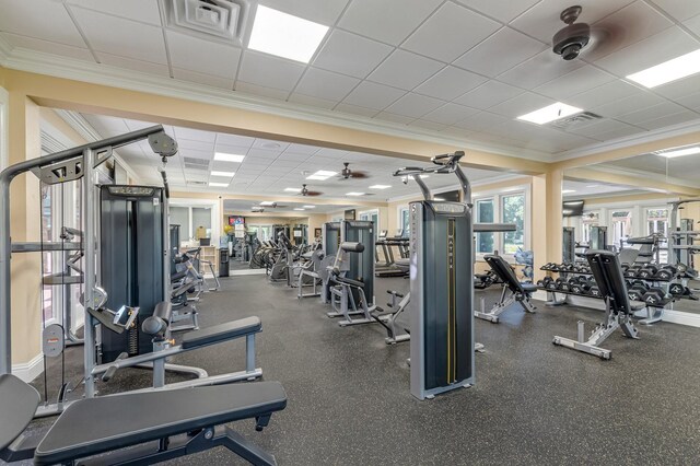 200 Riverfront Dr Unit B204, Palm Coast, FL 32137 - exercise room featuring crown molding and a paneled ceiling