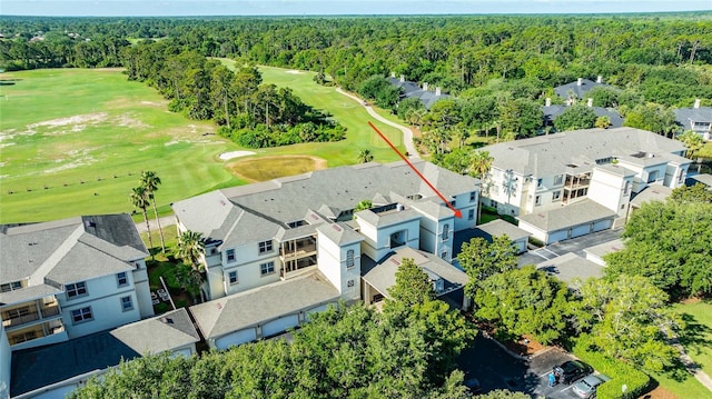 200 Riverfront Dr Unit B204, Palm Coast, FL 32137 - bird's eye view of a forest and a golf club