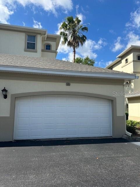 200 Riverfront Dr Unit B204, Palm Coast, FL 32137 - garage featuring driveway