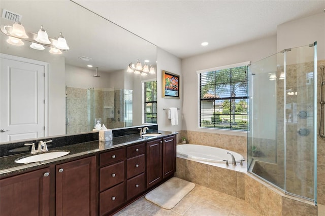 716 Woodbridge Ct, Ormond Beach, FL 32174 - bathroom featuring a stall shower, a garden tub, double vanity, tile patterned flooring, and a chandelier