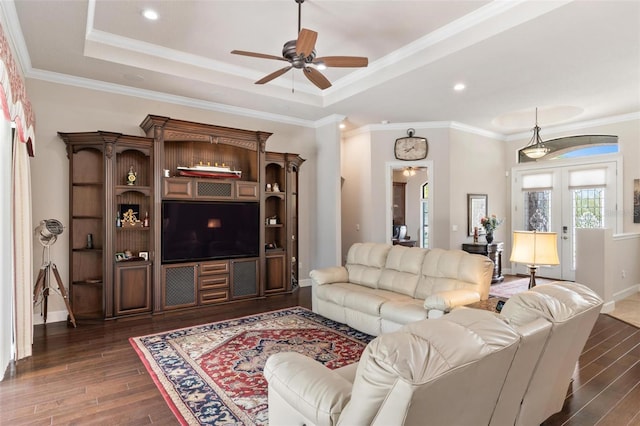 716 Woodbridge Ct, Ormond Beach, FL 32174 - living room with dark wood finished floors, ceiling fan, french doors, baseboards, and a raised ceiling