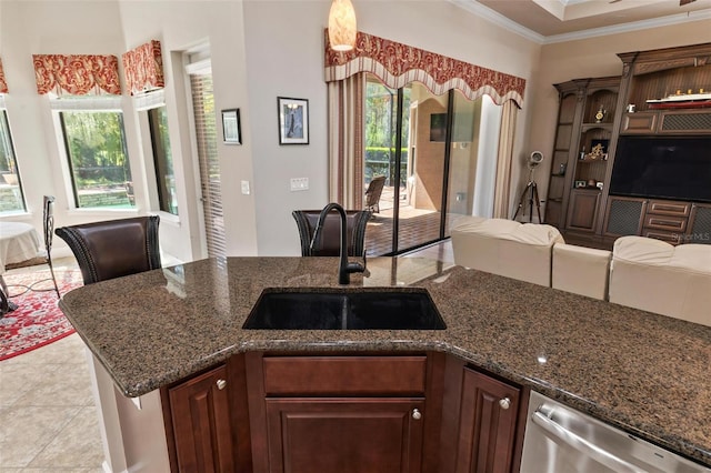 716 Woodbridge Ct, Ormond Beach, FL 32174 - kitchen with a sink, stainless steel dishwasher, ornamental molding, dark stone counters, and light tile patterned floors