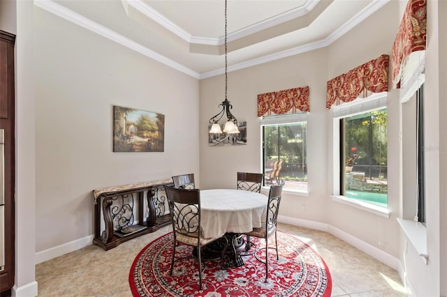 716 Woodbridge Ct, Ormond Beach, FL 32174 - dining space featuring a chandelier, ornamental molding, a raised ceiling, light tile patterned flooring, and baseboards