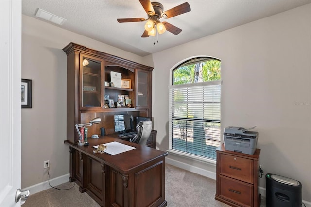 716 Woodbridge Ct, Ormond Beach, FL 32174 - office with baseboards, ceiling fan, and light colored carpet