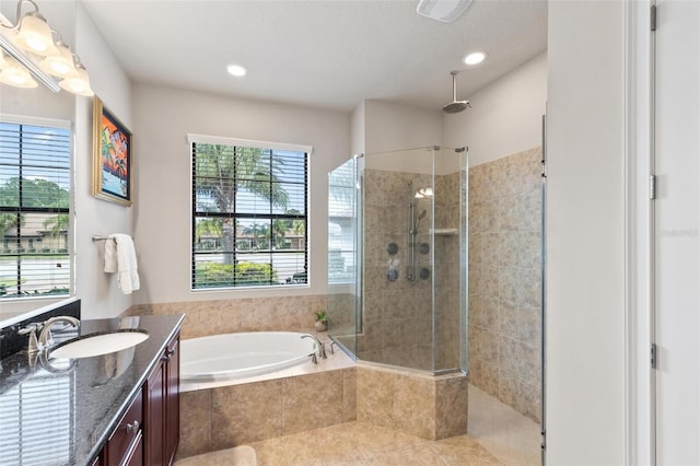 716 Woodbridge Ct, Ormond Beach, FL 32174 - bathroom featuring a shower stall, a bath, vanity, and recessed lighting