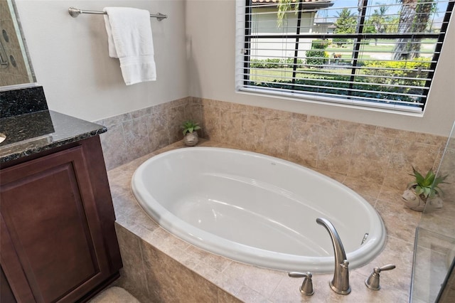 716 Woodbridge Ct, Ormond Beach, FL 32174 - full bath featuring vanity and a garden tub