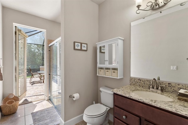 716 Woodbridge Ct, Ormond Beach, FL 32174 - full bathroom with toilet, vanity, an enclosed shower, tile patterned flooring, and baseboards