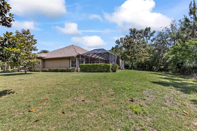 716 Woodbridge Ct, Ormond Beach, FL 32174 - view of property exterior featuring a lawn, stucco siding, glass enclosure, and a tile roof